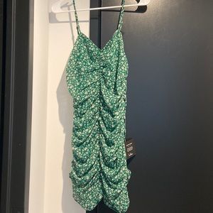 Lulu’s Walk the Walk Green Floral Print Ruched Bodycon Mini Dress (Small)